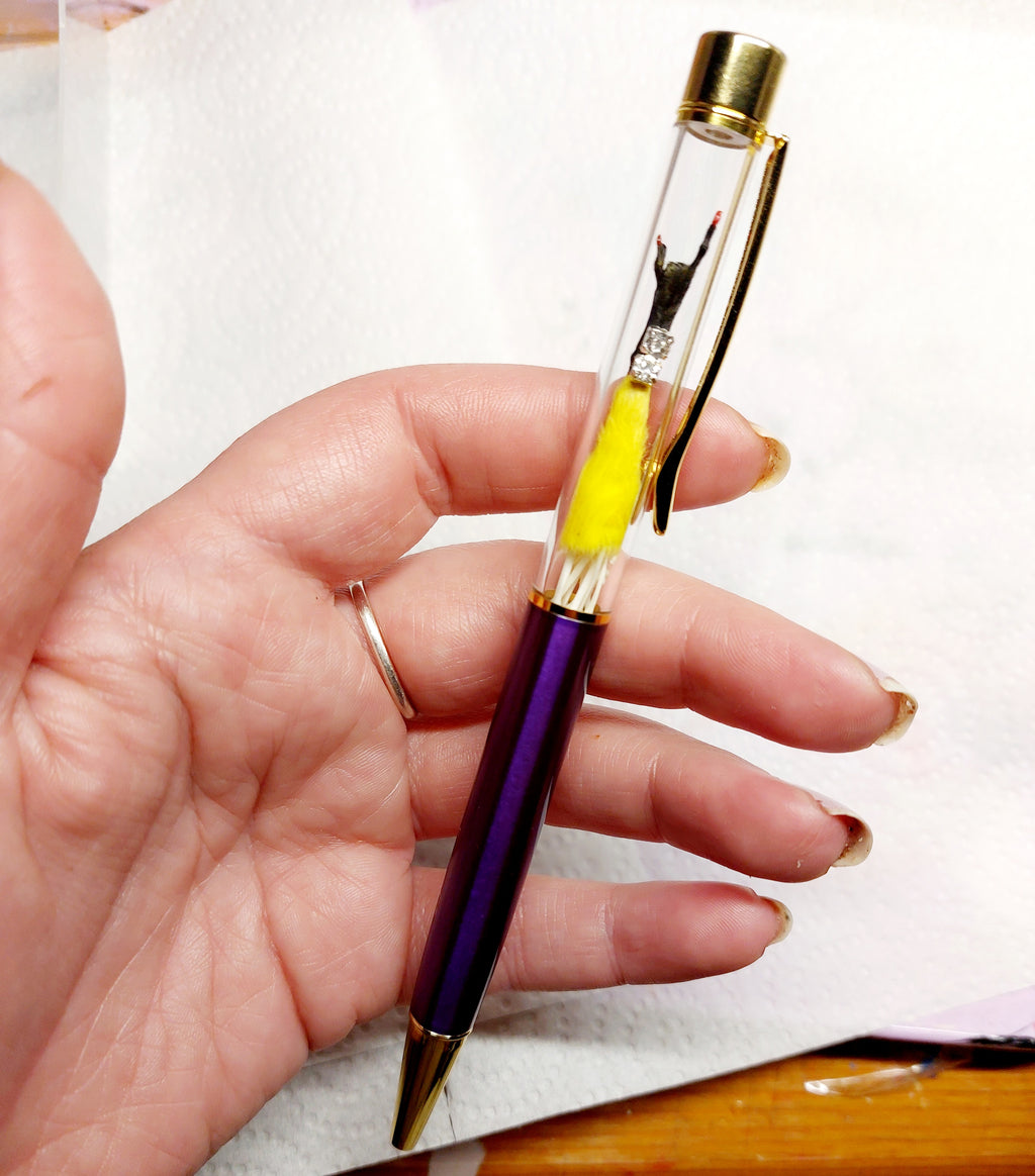 Rocker Mouse Ballpoint Pen Yellow/Black with black ink.