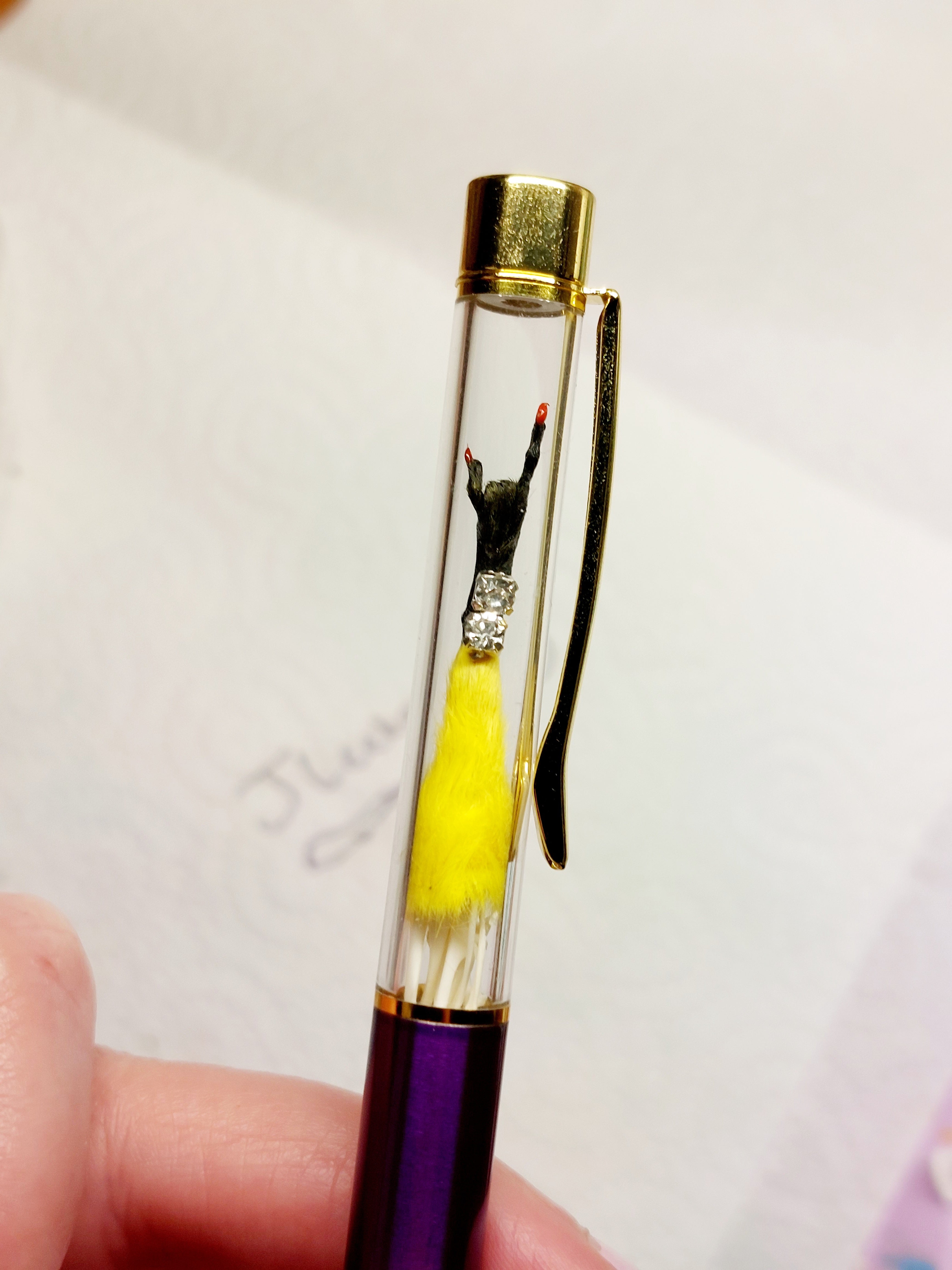 Rocker Mouse Ballpoint Pen Yellow/Black with black ink.