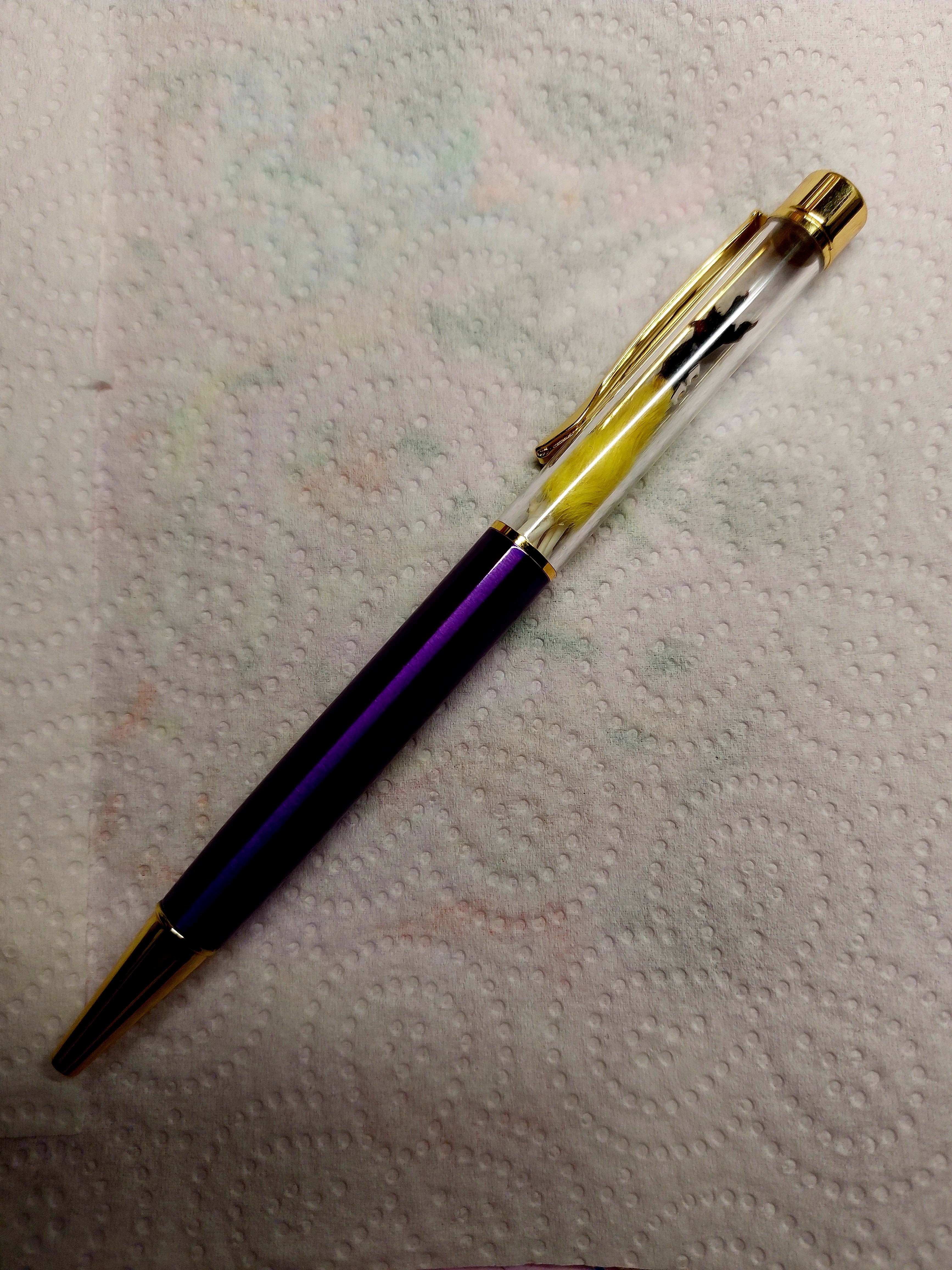 Rocker Mouse Ballpoint Pen Yellow/Black with black ink.