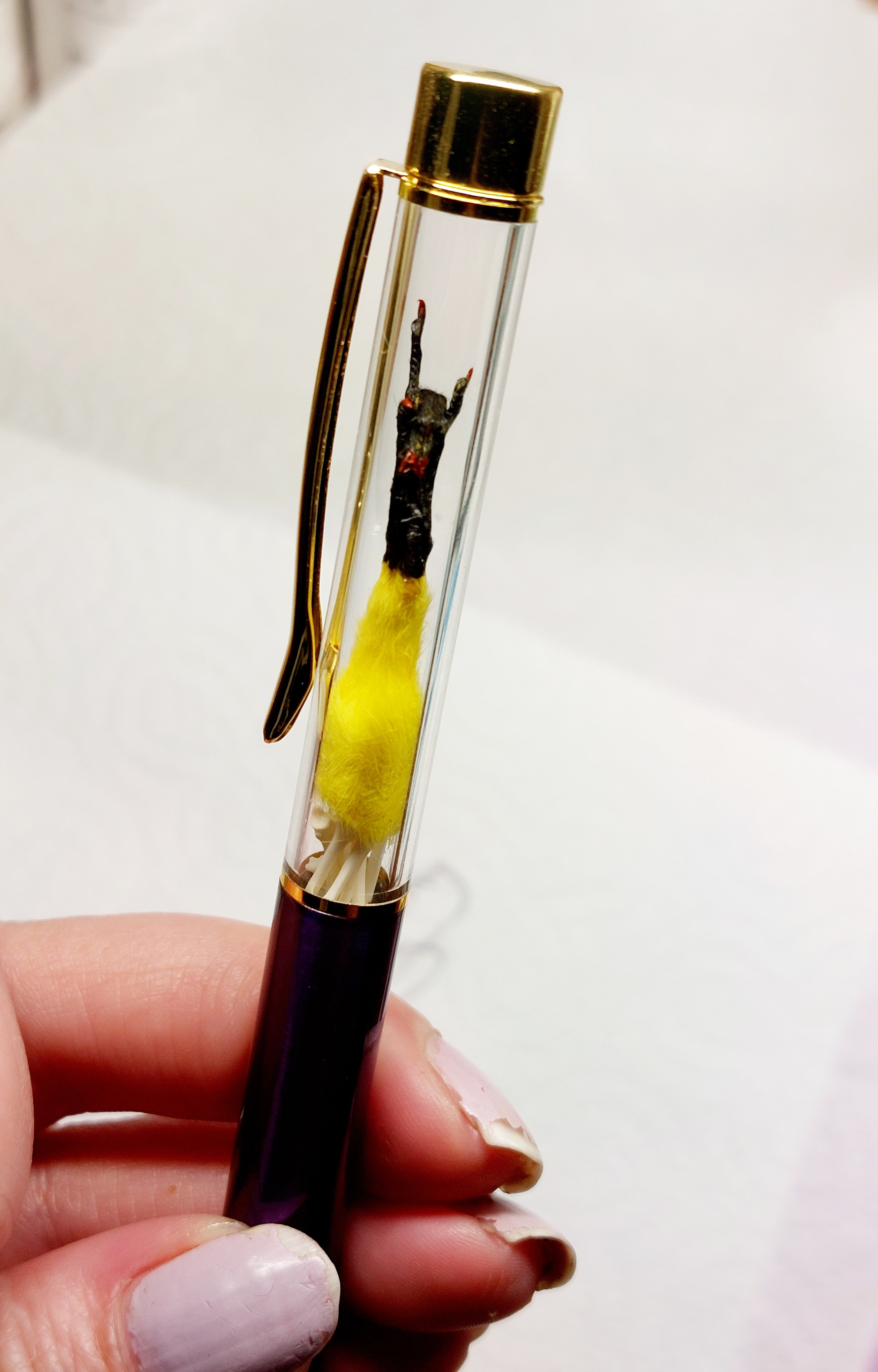 Rocker Mouse Ballpoint Pen Yellow/Black with black ink.